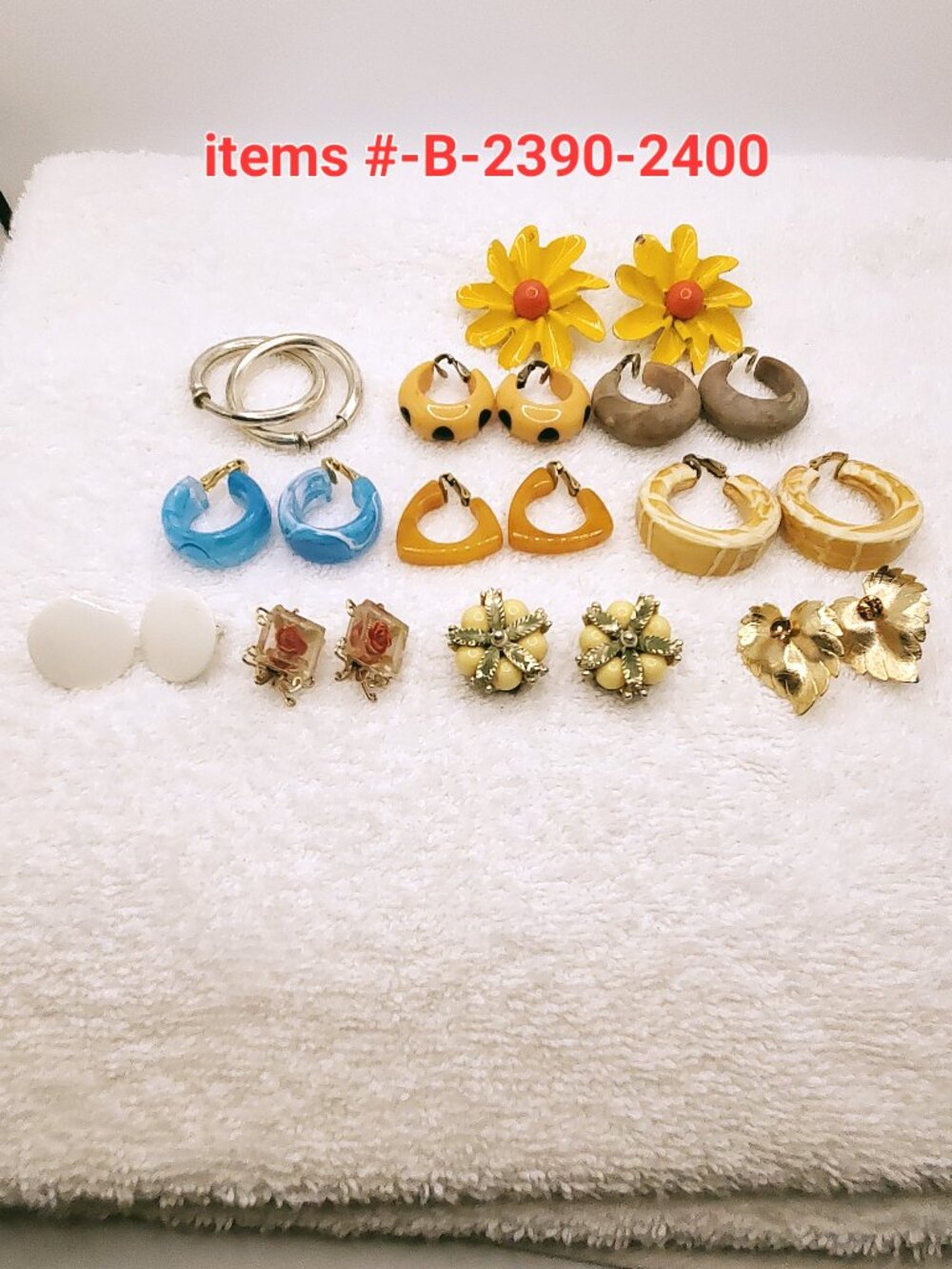 11 Pair of Clip on Earrings, items # B-2390-2400,. wt. 117 grams.